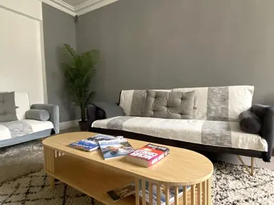 Coin salon dans l'établissement L'appartement des Champs Elysées