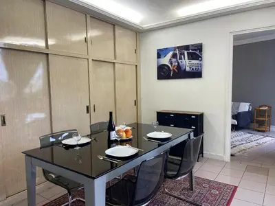 Coin salon dans l'établissement L'appartement des Champs Elysées