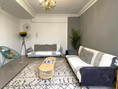 Coin salon dans l'établissement L'appartement des Champs Elysées