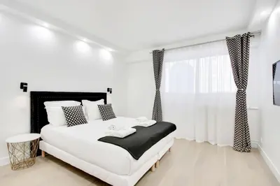 Un ou plusieurs lits dans un hébergement de l'établissement TROCADERO/ EIFFEL TOWER - 3 Bedrooms- All New!