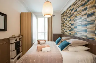 Un ou plusieurs lits dans un hébergement de l'établissement 2 BR Appartement Near Tour Eiffel & Trocadéro