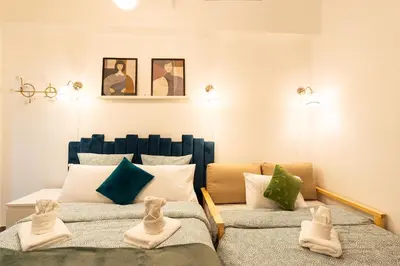 Coin salon dans l'établissement Studio - Moderne - Netflix & Wifi