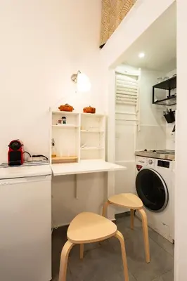 Cuisine ou kitchenette dans l'établissement Studio - Moderne - Netflix & Wifi