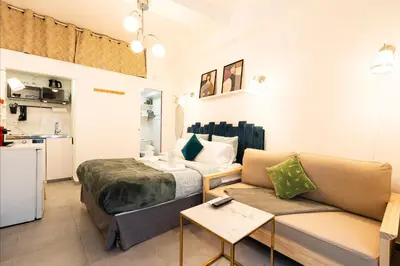 Cuisine ou kitchenette dans l'établissement Studio - Moderne - Netflix & Wifi