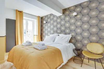 Un ou plusieurs lits dans un hébergement de l'établissement 169 Suite W - Élégant Appartement à Paris