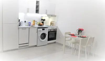 Cuisine ou kitchenette dans l'établissement Appartement tout équipé, cosy (1 station de Paris)