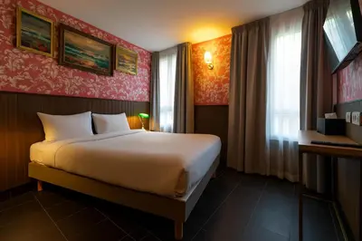Un ou plusieurs lits dans un hébergement de l'établissement Walled off Hotel Paris