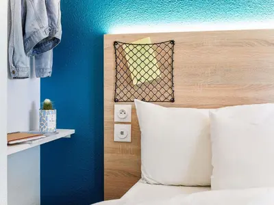 Un ou plusieurs lits dans un hébergement de l'établissement hotelF1 Paris Gennevilliers, 4 Rue Georges Corète 92230 Gennevilliers
