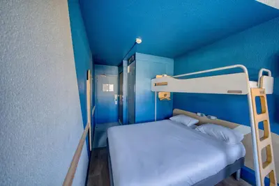 Un ou plusieurs lits dans un hébergement de l'établissement ibis Budget Gennevilliers Asnières - Rénové en 2025