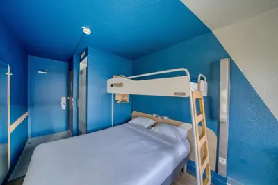 Un ou plusieurs lits dans un hébergement de l'établissement ibis Budget Gennevilliers Asnières - Rénové en 2025
