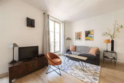 Télévision ou salle de divertissement dans l'établissement Cada Vez