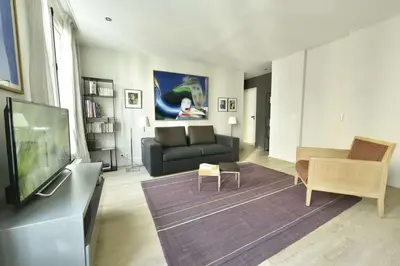 Télévision ou salle de divertissement dans l'établissement Champagne
