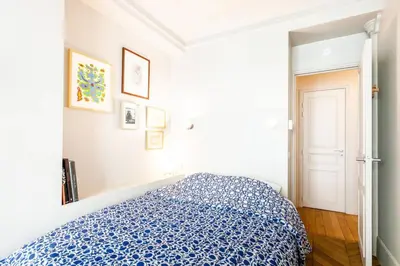 Un ou plusieurs lits dans un hébergement de l'établissement Greeter-Bel appartement Parisien de 70m2 - St Lazare