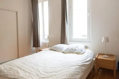 Un ou plusieurs lits dans un hébergement de l'établissement Apartment Well Located Bright And Quiet