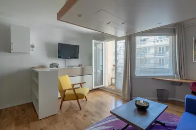 Télévision ou salle de divertissement dans l'établissement StayParis