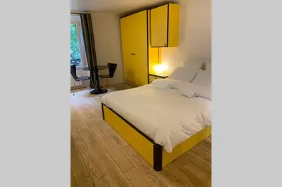 Un ou plusieurs lits dans un hébergement de l'établissement Paris 4 Le Marais RETRO Notre Dame Seine Aldaro