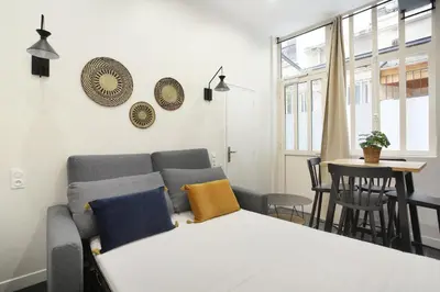 Coin salon dans l'établissement Rent a Room - Residence Charon