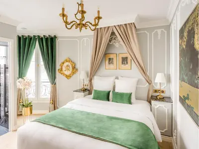 Un ou plusieurs lits dans un hébergement de l'établissement Merveil - Luxury Suite -Champs Elysees-Ponthieu II