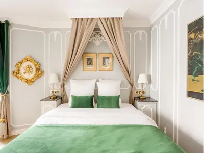 Un ou plusieurs lits dans un hébergement de l'établissement Merveil - Luxury Suite -Champs Elysees-Ponthieu II
