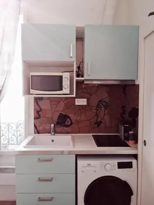 Cuisine ou kitchenette dans l'établissement Studio situé dans un quartier calme et résidentiel à Montrouge à seulement 2 minutes du métro