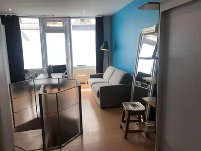 Coin salon dans l'établissement Loft 2 BR Loft Effeil tower AC by LCC Agency
