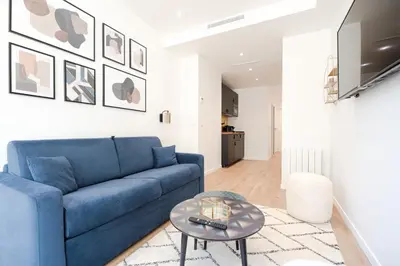 Télévision ou salle de divertissement dans l'établissement Luxury Residence - Paris South