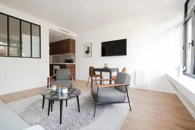 Télévision ou salle de divertissement dans l'établissement Luxury Residence - Paris South
