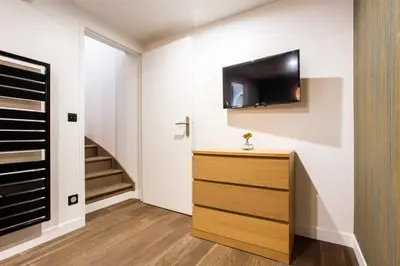 Télévision ou salle de divertissement dans l'établissement Appartement indépendant-2 chambres !!Parc des expositions