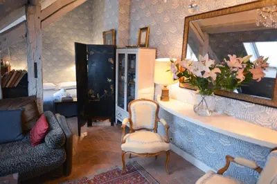 Coin salon dans l'établissement Charming Studio Near Louvre