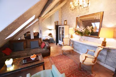Coin salon dans l'établissement Charming Studio Near Louvre