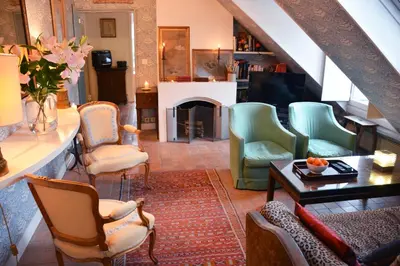 Coin salon dans l'établissement Charming Studio Near Louvre