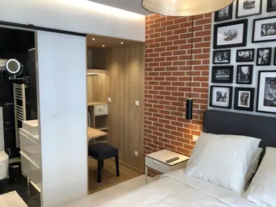 Un ou plusieurs lits dans un hébergement de l'établissement Appartement Hainaut Paris XIXème- Tout Equipé!