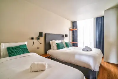 Un ou plusieurs lits dans un hébergement de l'établissement 130 - Urban Brand New 110m2 Flat in Montorgueil