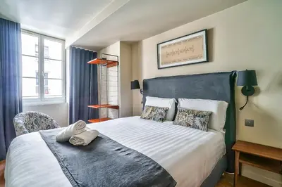 Un ou plusieurs lits dans un hébergement de l'établissement 133 - Urban Amazing Flat Montorgueil
