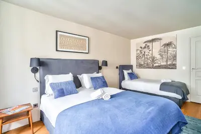Un ou plusieurs lits dans un hébergement de l'établissement 133 - Urban Amazing Flat Montorgueil