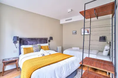 Un ou plusieurs lits dans un hébergement de l'établissement 118 - Urban Luxury Flat La Sorbonne