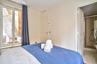 Un ou plusieurs lits dans un hébergement de l'établissement 118 - Urban Luxury Flat La Sorbonne