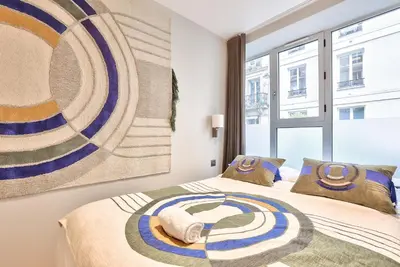Un ou plusieurs lits dans un hébergement de l'établissement 121 - Urban Gorgeous Flat in Montorgueil