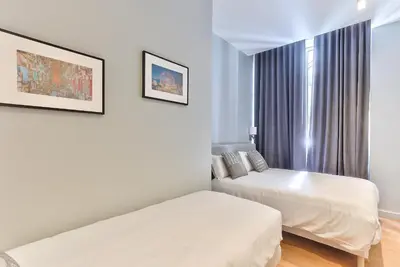 Un ou plusieurs lits dans un hébergement de l'établissement 124 - Urban Fabulous Flat