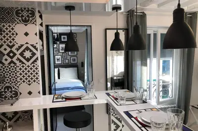 Un ou plusieurs lits dans un hébergement de l'établissement Appartement Rousselet Quartier Bon Marché Paris VIIème