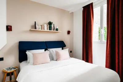 Un ou plusieurs lits dans un hébergement de l'établissement Edgar Suites Auteuil - Le Marois