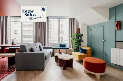 Coin salon dans l'établissement Edgar Suites Auteuil - Le Marois