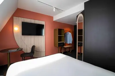 Télévision ou salle de divertissement dans l'établissement ibis Styles Paris Porte de Versailles - Mairie d'Issy