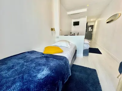 Un ou plusieurs lits dans un hébergement de l'établissement L'Oasis Montparnasse