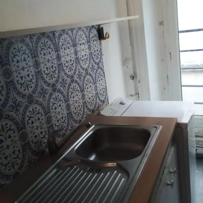 Cuisine ou kitchenette dans l'établissement Studio Centre de Paris en face de la Seine