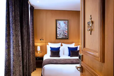 Un ou plusieurs lits dans un hébergement de l'établissement Hotel Pas De Calais