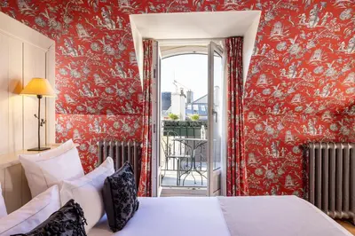 Un ou plusieurs lits dans un hébergement de l'établissement Hotel Pas De Calais