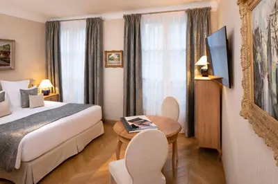 Un ou plusieurs lits dans un hébergement de l'établissement Hotel Pas De Calais