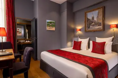 Un ou plusieurs lits dans un hébergement de l'établissement Hotel Pas De Calais