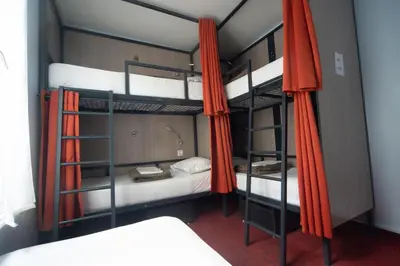 Un ou plusieurs lits dans un hébergement de l'établissement City Inn Paris